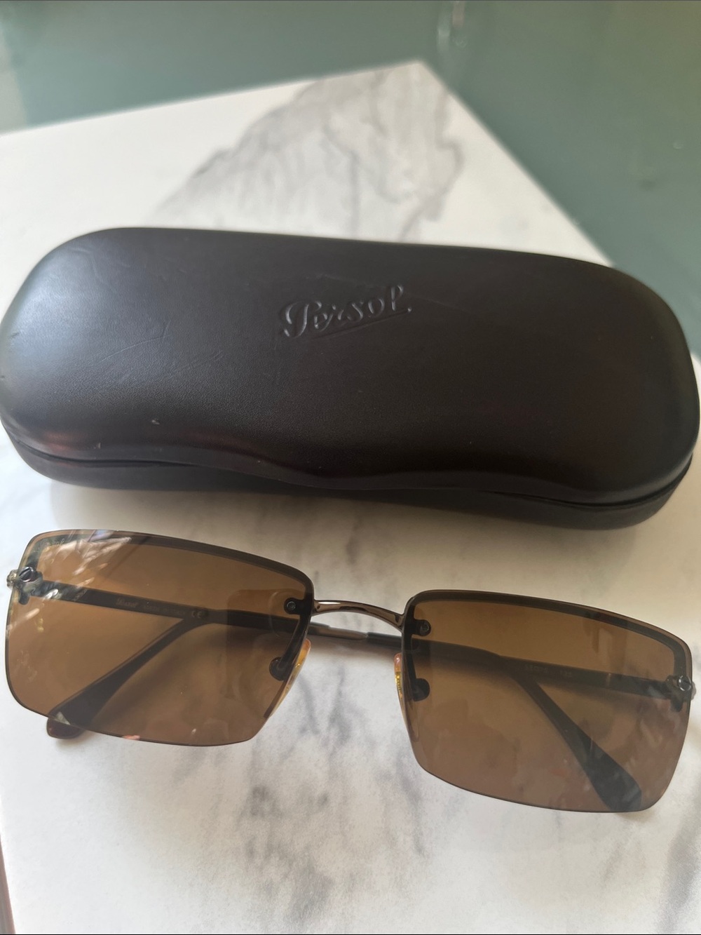 Persol Men’s Brown Lens Rimless Sunglasses with Brown Case